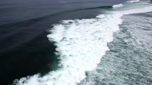 Big waves crash on the beach