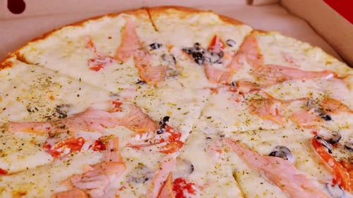 Close Up of Mouth-Watering Pizza with Cheese and Fish