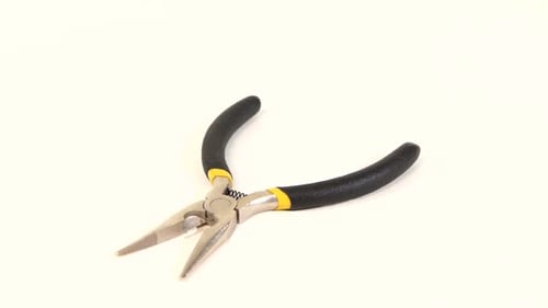 Close up of Pliers on White Background