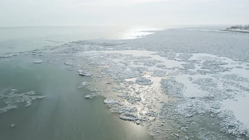 Aerial View Ice Hummock and Cracks at Frozen Lake