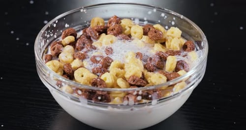 Milk Being Poured Into Cereal Bowl