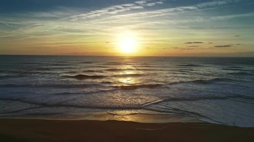 Aerial of Big Waves of Atlantic Ocean and Sunset