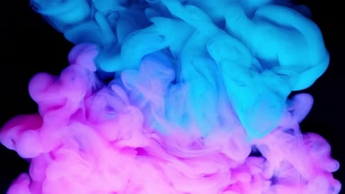 Abstract Blue and Pink Ink Swirls on Black