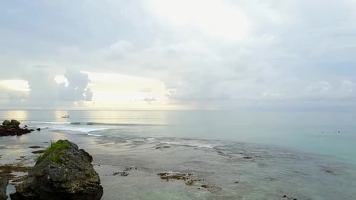 Huge Clouds Over the Ocean in the Rays of Sunset