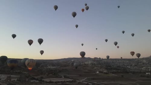 Hot Air Balloons Flying at Sunrise in Cappadocia