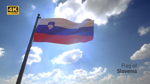 Slovenian Flag Waving in Sunny Blue Sky with Clouds