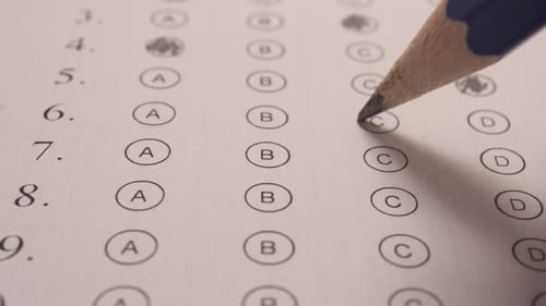 Shading With Pencil The Chosen Correct Answer In Multiple Choice Exam. Close Up