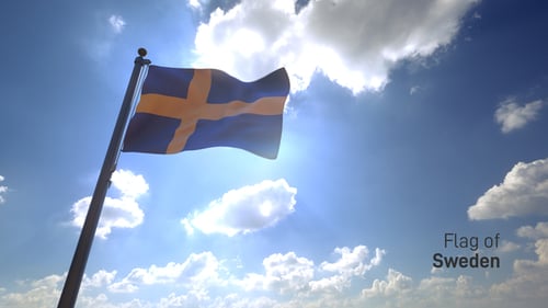 Swedish National Flag Waving Under a Bright Sunny Sky