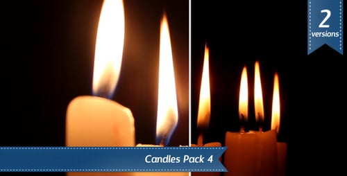 Burning Candle Flames in Dark Room