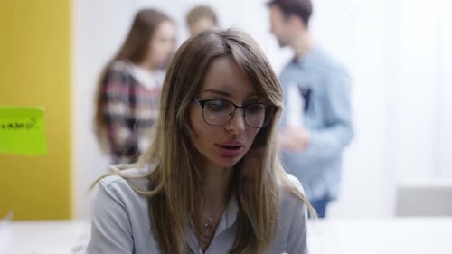 Woman Leader on Corporate Training Using Glass Wall to Wite Strategy Front View