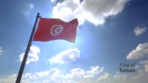 Tunisia National Flag Waving with Sun Flare on Blue Sky