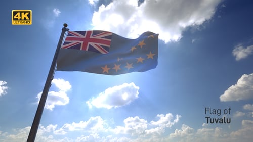 Tuvalu Flag Waving in Sunny Blue Sky with Clouds