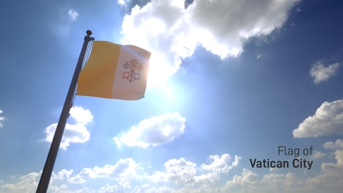 Vatican City Flag Waving in Sunlight Against Blue Sky