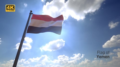 Realistic Flag Waving in Sunlight Against Blue Sky