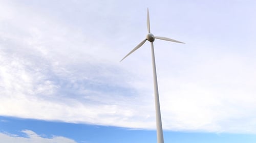 Wind Turbine Over the Blue Sky