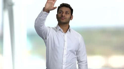 Young Adult Interacting with a Virtual Interface