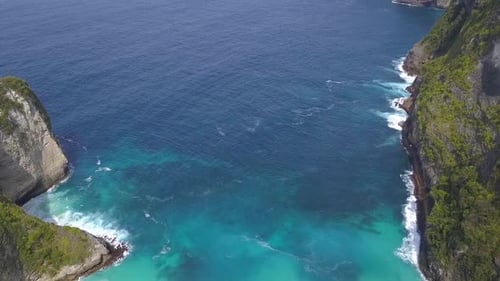 Gorgeous aerial view flight panorama overview drone shot high in the sky.
Kelingking Beach at Nusa P