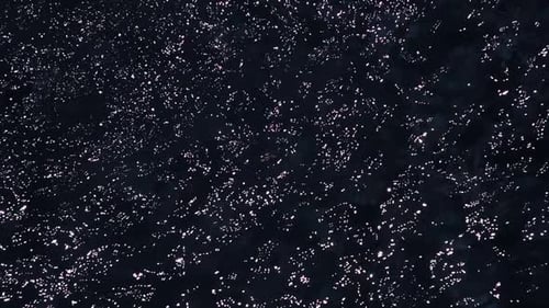 Slow Motion of Waves on Dark Water Surface Close Up