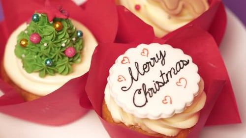 Festive Christmas Cupcakes with Holiday-Themed Decorations