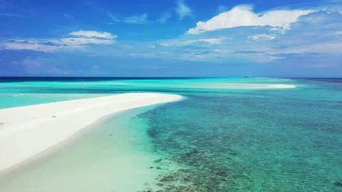 Aerial top down abstract of exotic tourist beach break by clear lagoon with white sandy background o