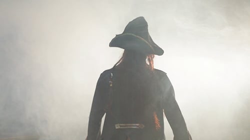 Pirate Figure Walking through Fog