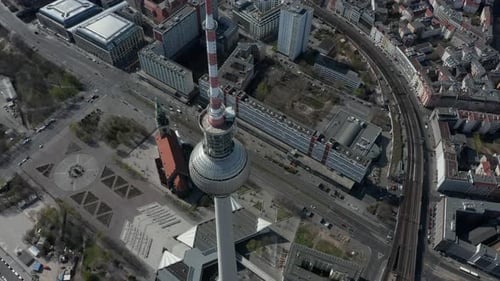 AERIAL: Close View of Alexanderplatz TV Tower in Empty Berlin, Germany with No People or Cars on