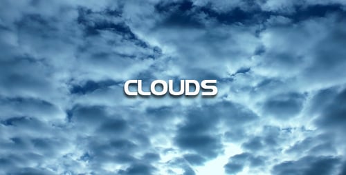 Clouds Moving Across Blue Sky on Sunny Day