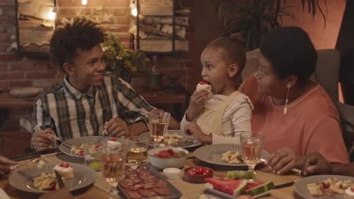 Family Meal Around the Dinner Table