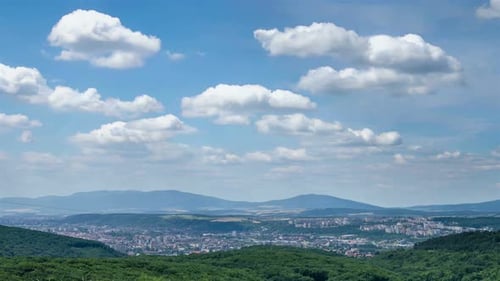 Clouds Sky Moving over Small Town in Green Nature Landscape