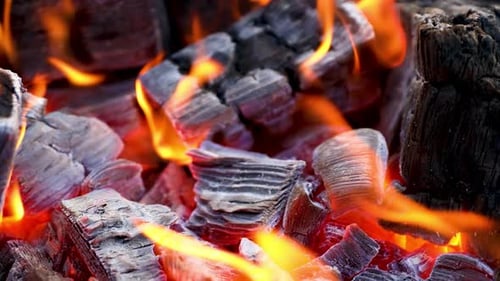 Close Up of Glowing Charcoal Embers and Flames
