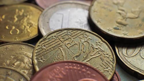 Coins of the Countries of the Euro Coin Rotating at a Slow Pace