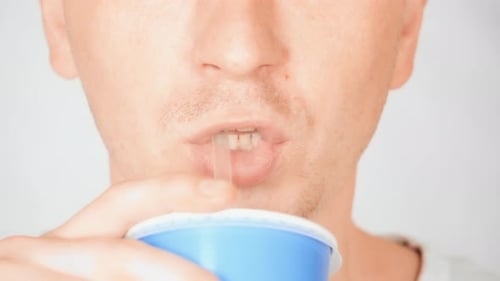 Close Up Face Fair Man Drinking