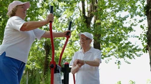 Seniors Exercising Together in Green Urban Park