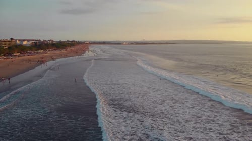 Flight at Sunset Overlooking the Indian Ocean in Bali Indonesia