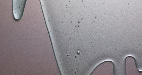 Thick Clear Liquid Dripping on a Smooth Surface