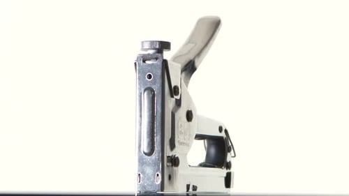 Close Up of Shiny Metallic Staple Gun