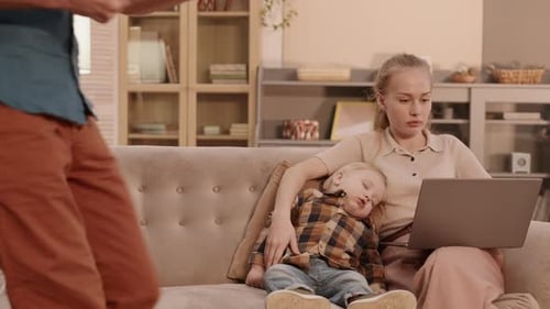 Family Relaxing Together at Home With Technology