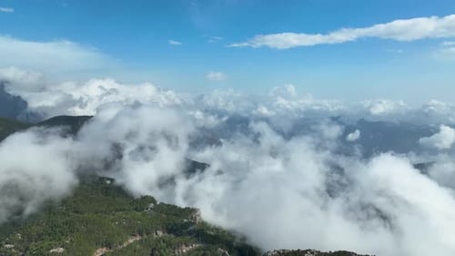 Cloudy landscape high in the mountains aerial view 4 K