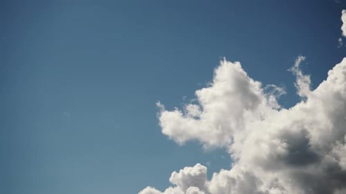 Clouds Drifting in Blue Sky on Sunny Day