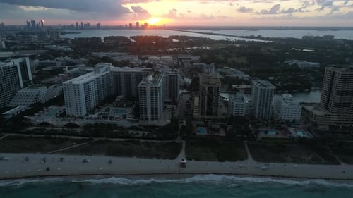 Miami Beach Sunset Aerial City Overview Above Waterfront Tall Buildings and Downtown Skyline