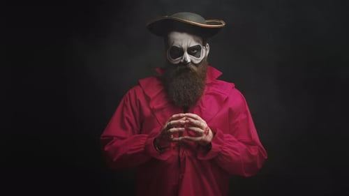 Man With Skull Makeup and Pirate Hat