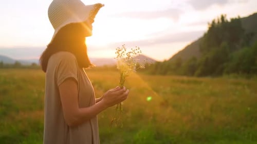 Profile Female Posing with Chamomiles