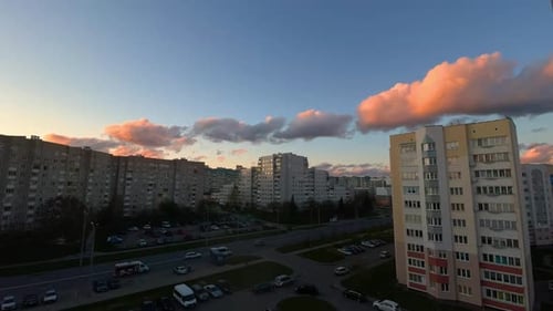 Timelapse Sunset Over the City with Clouds