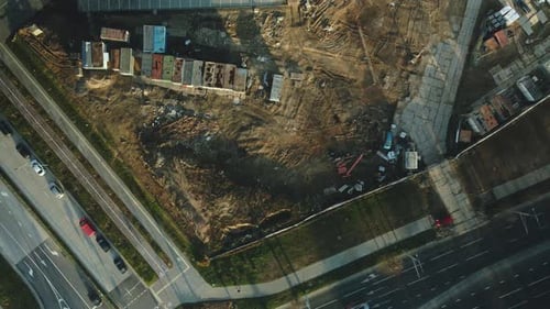 Aerial View of Construction Site and Urban Street