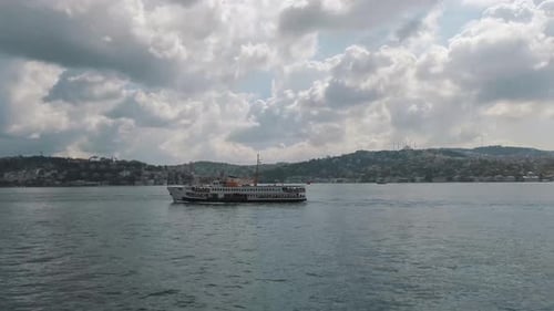 Ferryboat Sailing Across the Sea in a Wide Shot