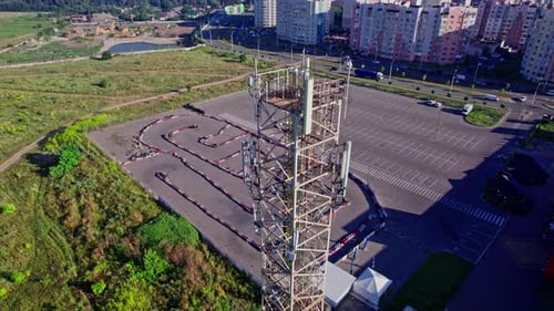 Telecommunication Tower with Antennas Against Blue Sky