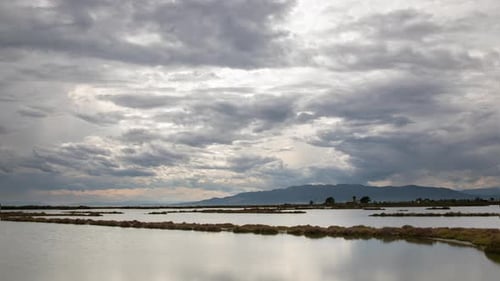 Timelapse Footage of Moving Clouds Reflected in Sea