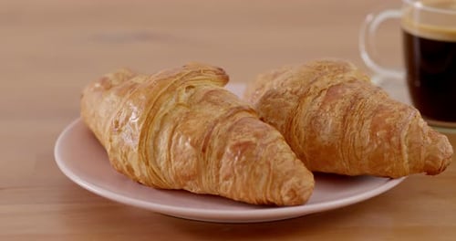 Fresh Croissants and Black Coffee Still Life