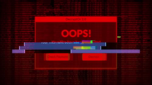 oops! you files have been encrypted computer hacker warning message over red computer code