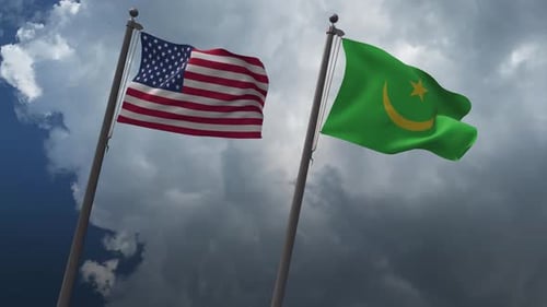 American and Mauritanian Flags Waving in Sky